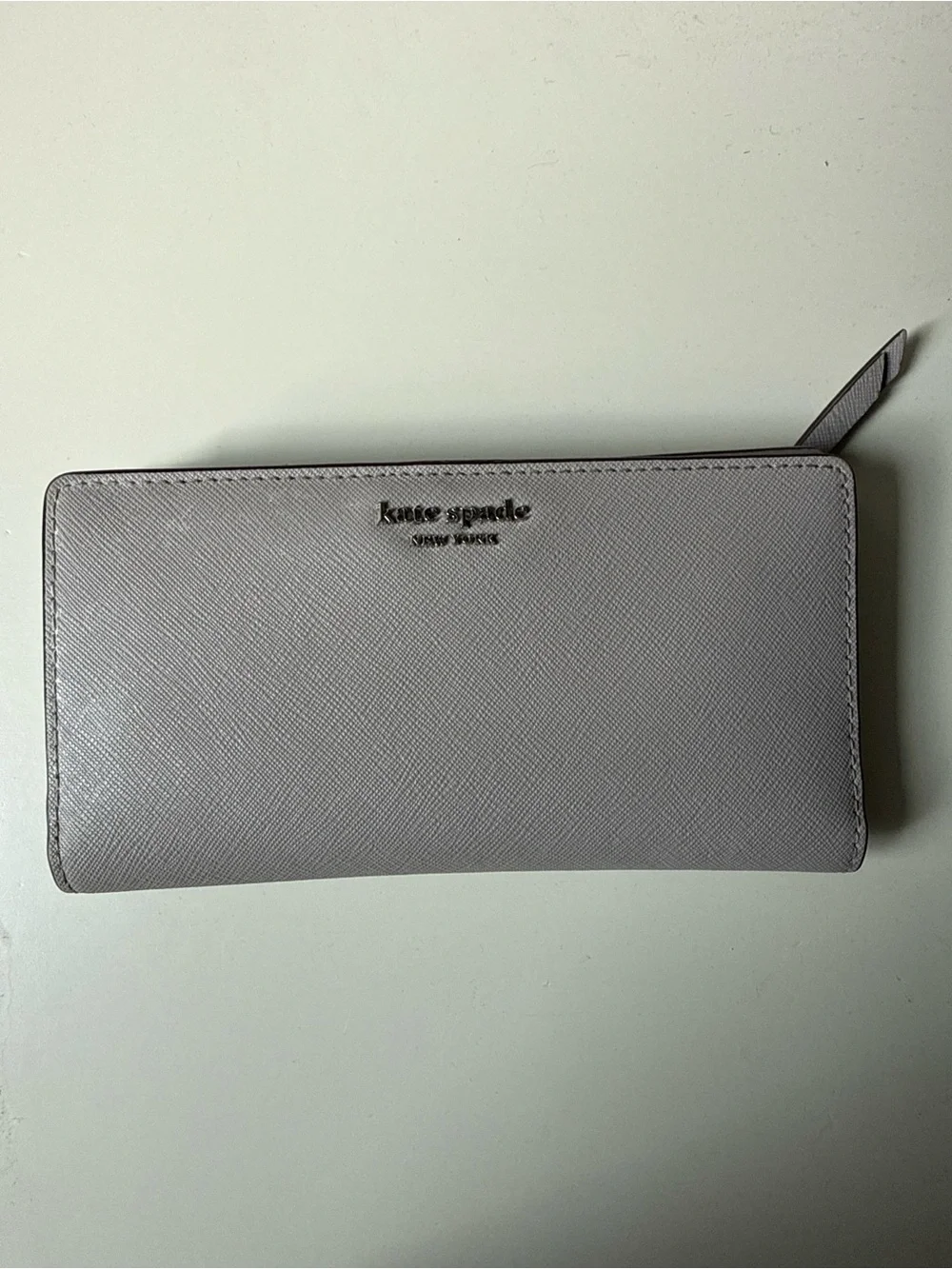 kate spade light gray wallet with silver hardware